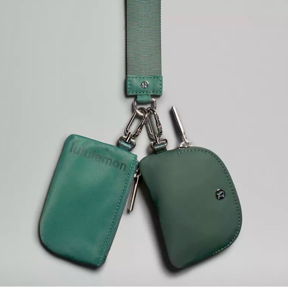 Brand new Lululemon duel wristlet Forest/Medium Green